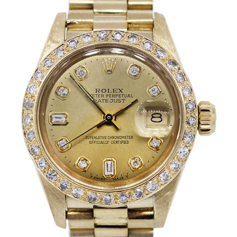 rolex gold and diamond watch.